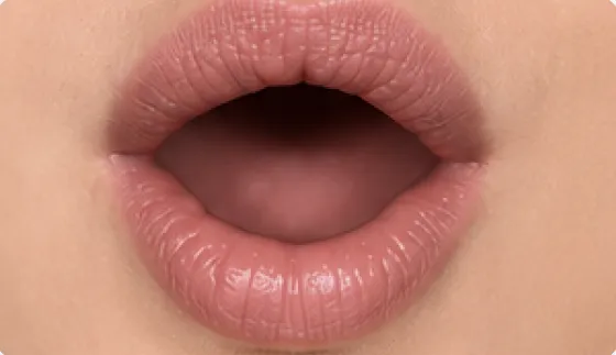 Mouth position for the French vowel [o], as in hôtel, beau